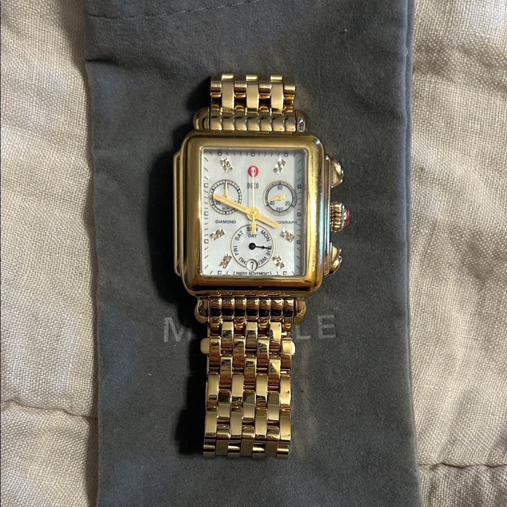 Gold Michele Watch with Diamonds and pearl background